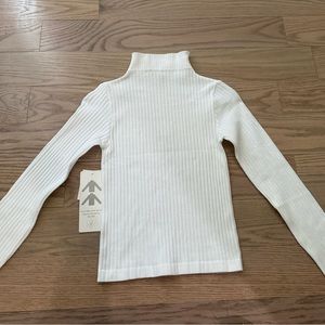 White mock neck long sleeve shirt